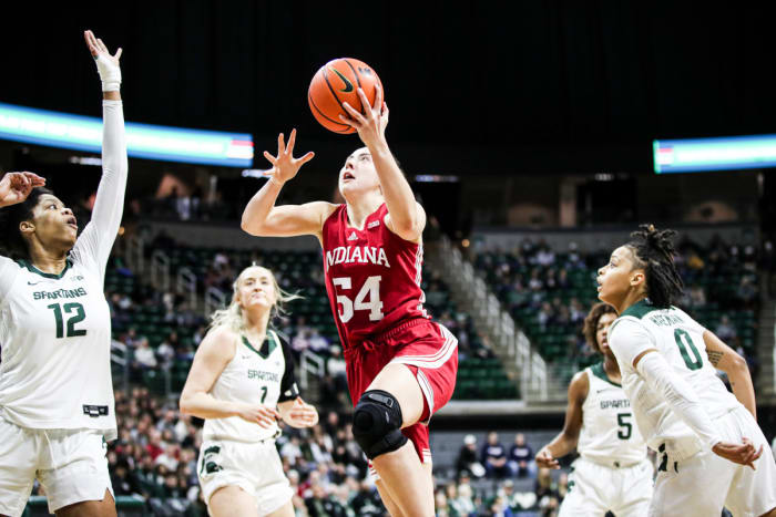 Mackenzie Holmes (54) goes in for the layup versus Michigan State in the Breslin Center on Dec. 29, 2022.